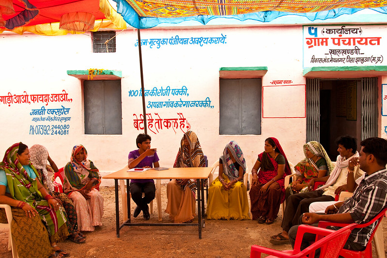 A panchayat meeting in progress under the leadership of Sarpanch Vandana Bahadur. Gram Panchayat- Khaal Khandvi, District Megh Nagar, Jhabua, MP. Photo credit: UN Women/Gaganjit Singh. https://www.flickr.com/photos/unwomenasiapacific/7514220330/in/photostream/